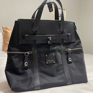 Henri Bendel jet setter black backpack bag